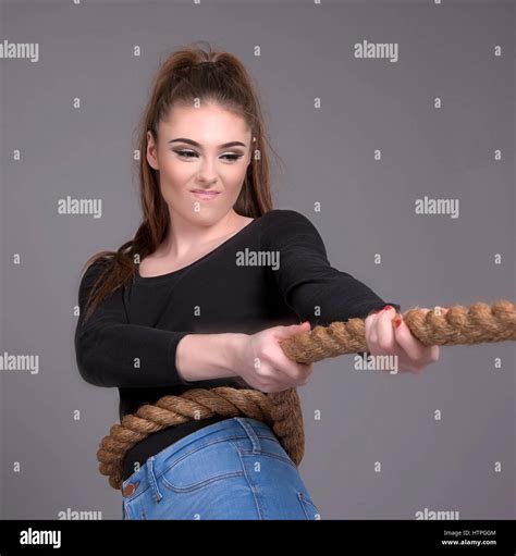 Girl Pulling Rope Pictures, Images and Stock Photos